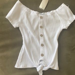 White buttoned and tie off the shoulder shirt